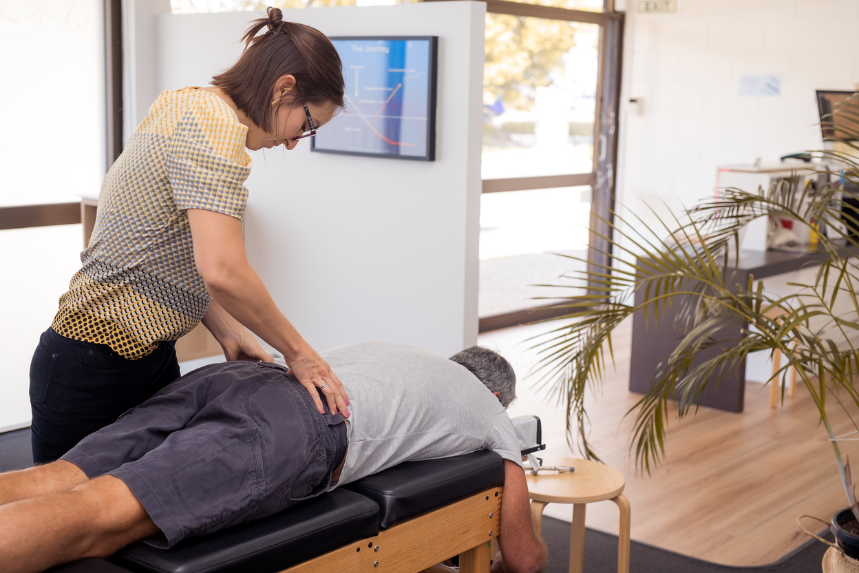 Senior Man Having Chiropractic Adjustment.